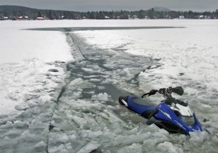 Snowmobile in ice