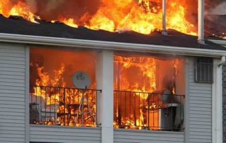 An apartment complex ignites after grilling too close to the building
